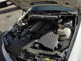 242.bm1b06 Bmw 325ci 2006 Transmission Shift 19461474