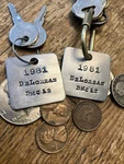 (2) 1981 Delorean Dmc 12 Aluminum Key Pair Of Chain Fobs. Fixed Price $29.95.