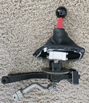 Barton Shifter With Red Flat Stick And Blk Knob (MT)09-23 Dodge Challenger. Fixed Price $479.99.