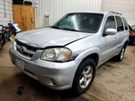 Gear Shifter Tribute 2005 Transmission 1892930. Fixed Price $60.00.