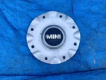 One (1) 2002-2009 15" Mini Cooper Silver Center Cap 1512574 6756676 59361. Fixed Price $14.00.