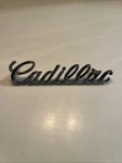 1977-79 Cadillac Deville Fleetwood Header Grille Emblem # 1607891 **mint**. Fixed Price $44.99.