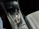 Used Automatic Transmission Shift Lever Assembly Fits: 2014 Toyota Corolla Grad. Fixed Price $80.00.