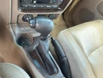 04 Rainier Floor Shifter Lever Unit Automatic Transmission Tan 332. Fixed Price $250.00.
