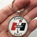 Vintage Hurst Floor Shifter Sign Logo Emblem Decal 1.2" Diameter Keychain. Fixed Price $12.95.